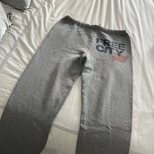 Grey free city sweatpants with orange bird